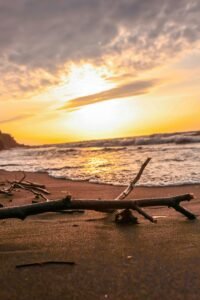 Beautiful sunset over the sandy shores of Ünye Beach, Ordu, Türkiye.